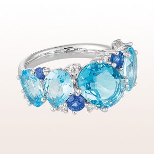 Ring with topazes 6,16ct, sapphire 0,66ct and brilliant cut diamonds 0,16ct in 18kt white gold