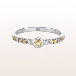 Ring with yellow sapphires 0,19ct and brilliants 0,04ct in 18kt white gold