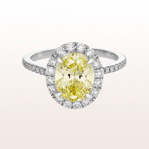 Ring mit ovalem Diamant fancy intense yellow 1,84ct und Brillanten 0,50ct in 18kt Weißgold