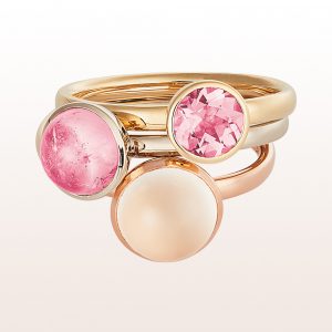 Ring-collection with rubellite 0,92ct, rubellite cabouchon 1,75ct and white moonstone cabouchon in 18kt yellow-, white-, and rose gold