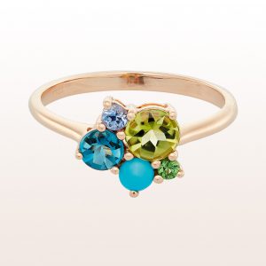 Ring with peridot, tourquoise, topaz and sapphire in 18kt yellow gold
